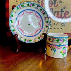 Small vintage teacup and saucer